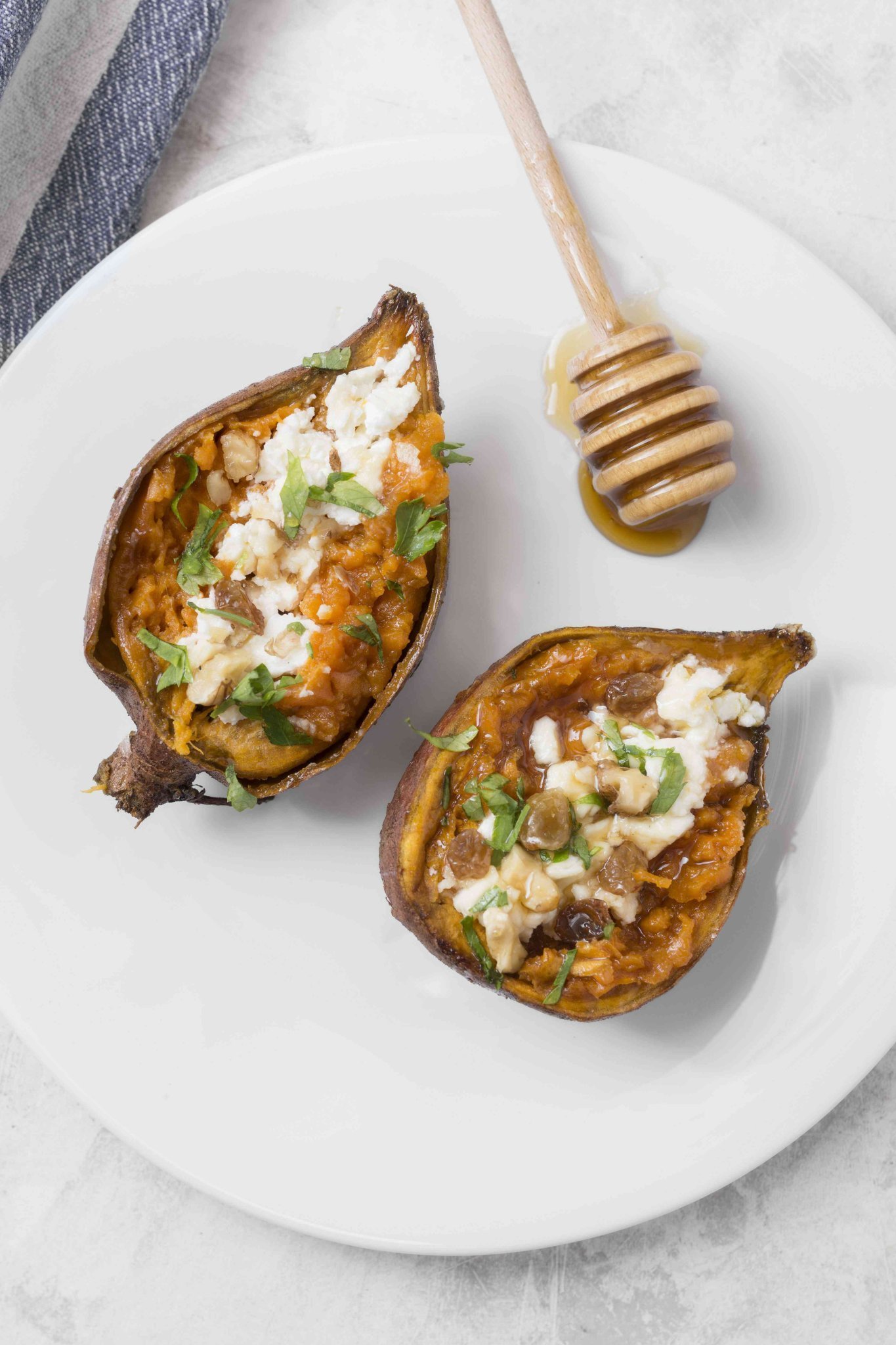 Baked sweet potato with honey and cheese